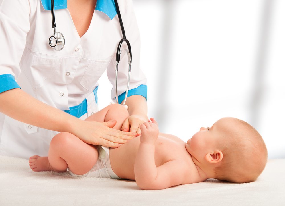 nurse checking baby