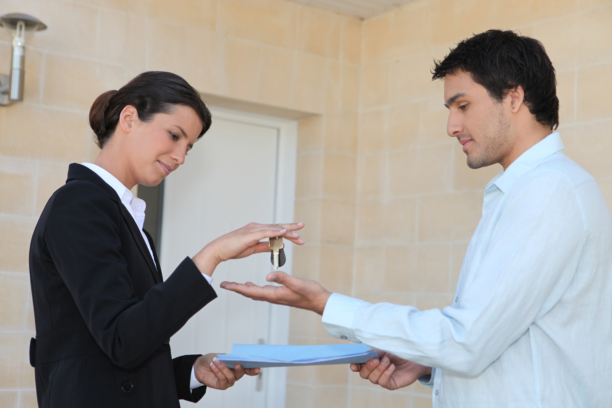 new owner receives the keys to his property